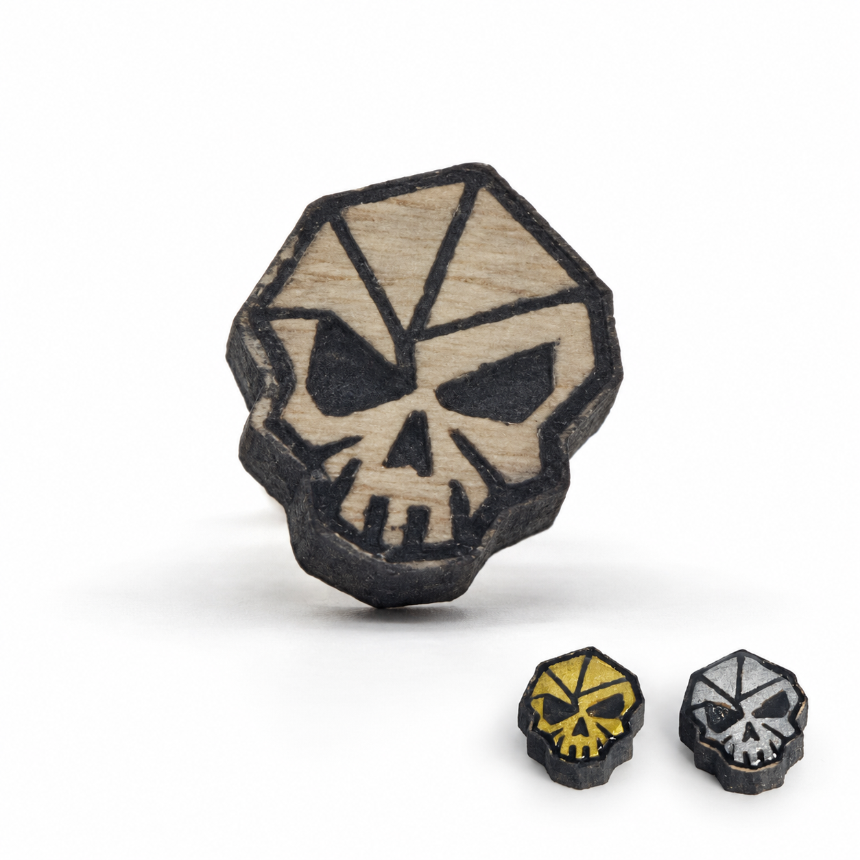 Clous d’oreilles crâne en bois, trois finitions